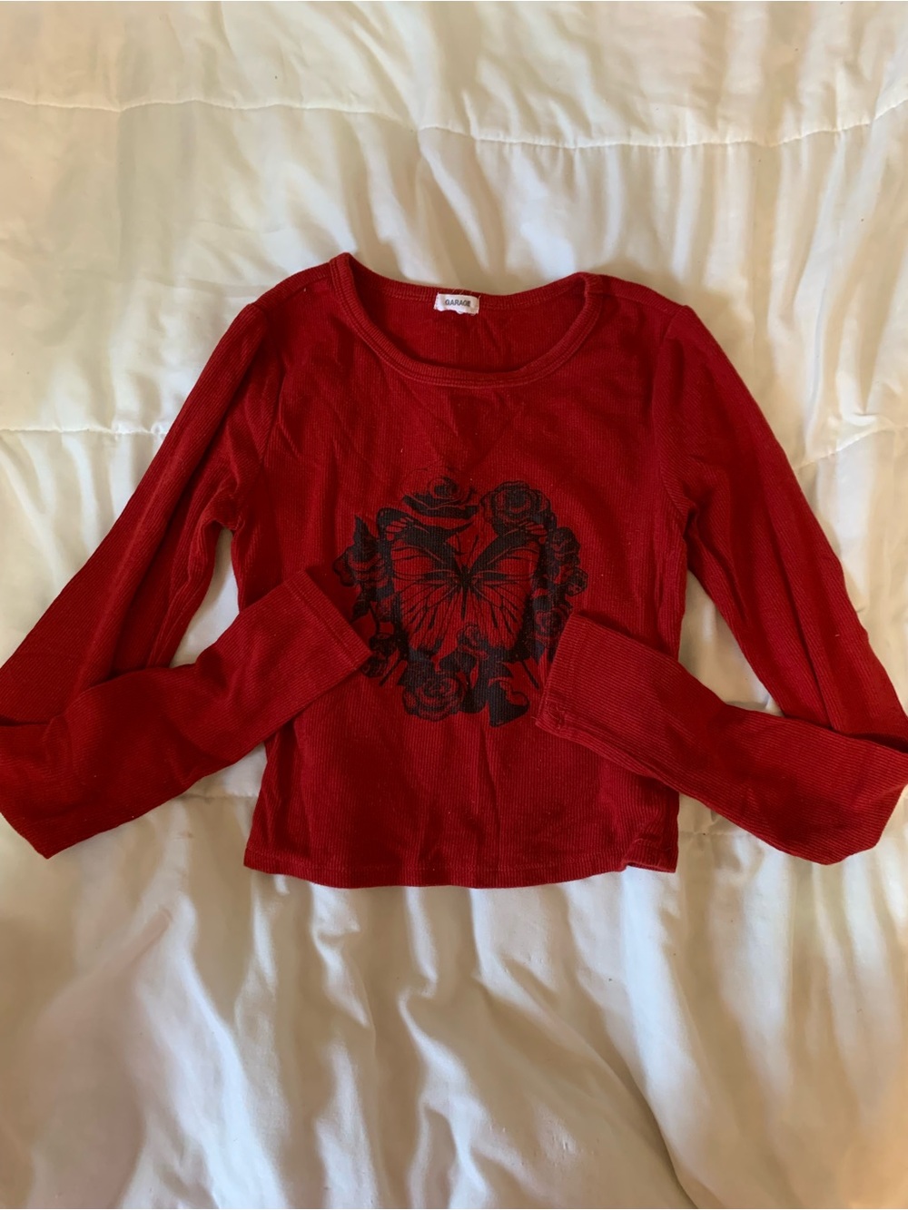 garage cropped red long-sleeve top with black butterfly graphic